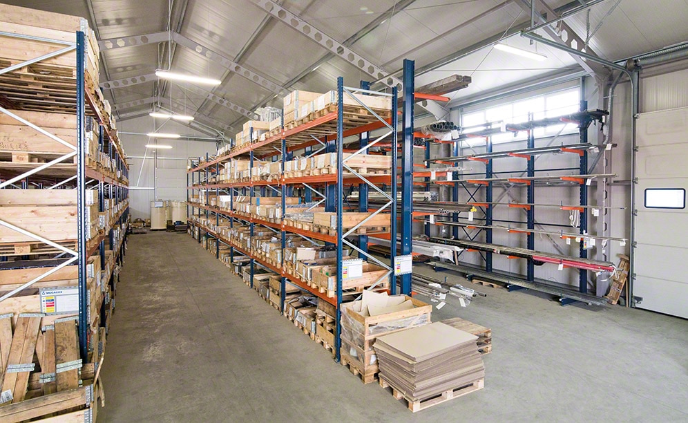 The racks store metal profile materials, pallets and various sized boxes