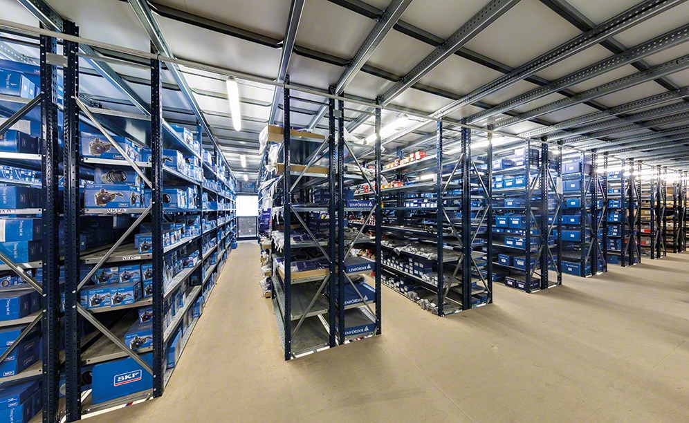 The aisles are wide enough so operators move about with handcarts, picking and replenishing products