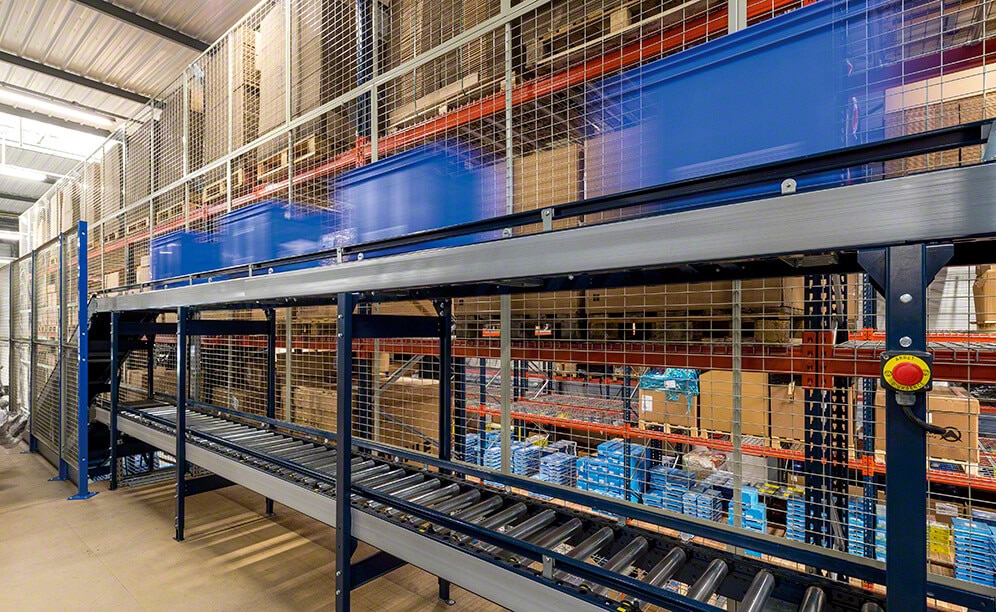The conveyor system joins the three warehouse floors together automatically