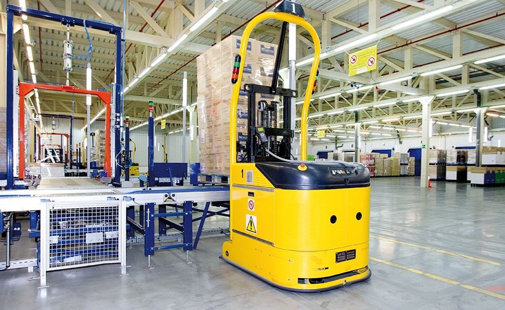 Laser guided forklifts (LGV) handle pallets leaving the warehouse