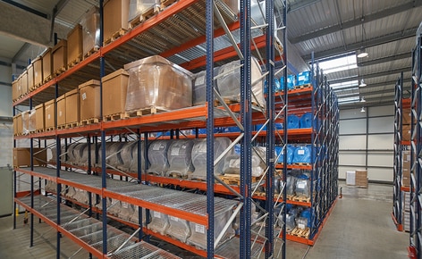 Pallet racking and racks on mobile bases store raw materials and finished products for a leading plastic packing manufacturer