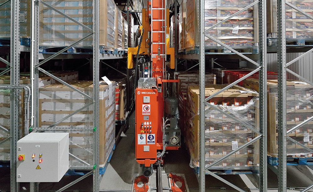 The automated pallet warehouse has a single aisle along which a pallet stacker crane