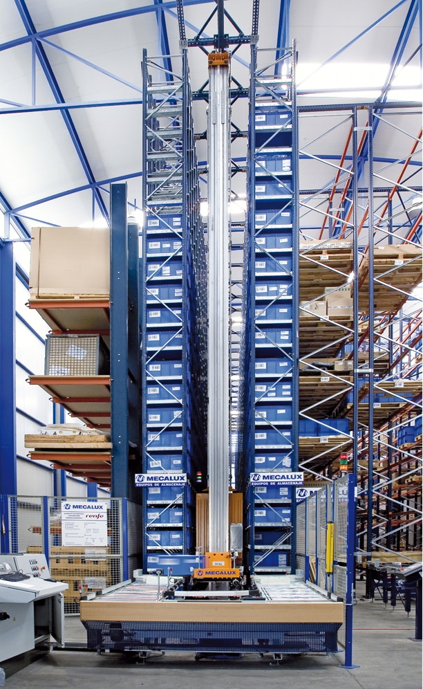 A stacker crane is responsible for transporting the boxes between order prep stations and locations in the single-deep pallet rack